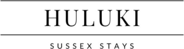 Huluki Sussex Stays logo